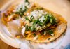 Taco tortilla folded around a filling